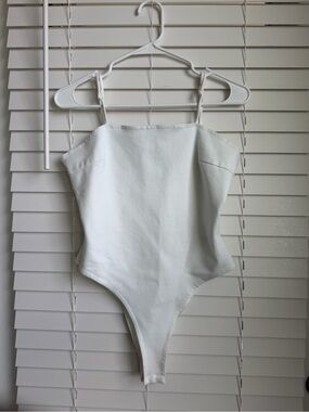 Chic White Spaghetti-Strap Bodysuit with Adjustable Straps